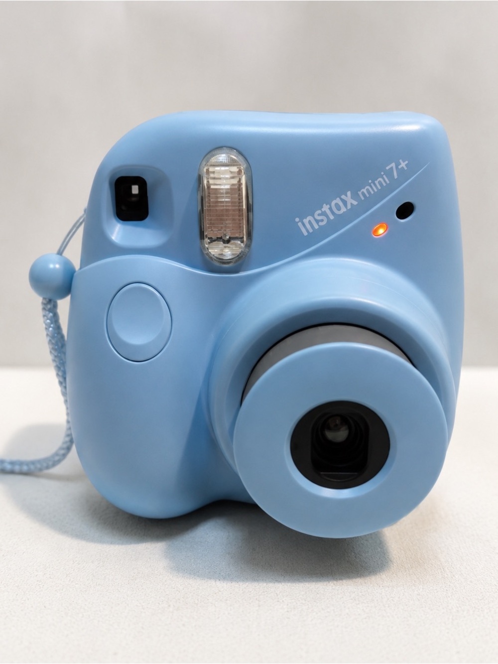 Fujifilm Instax Mini 7+ instant camera blue photos